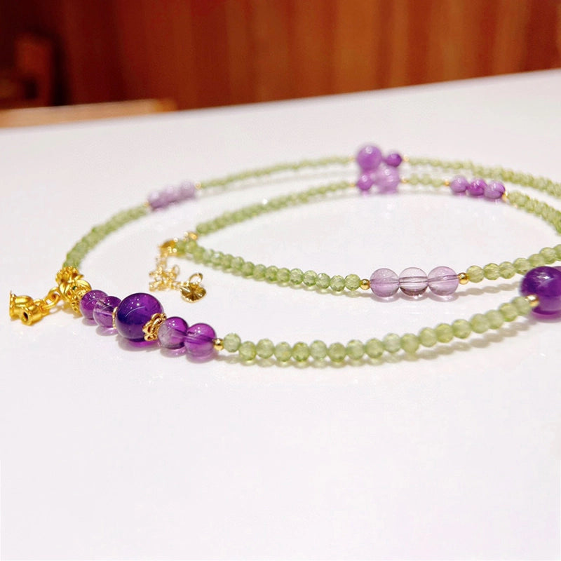 Adjustable Peridot and Amethyst bracelet convertible to a necklace with gold accents by Roline Crystal