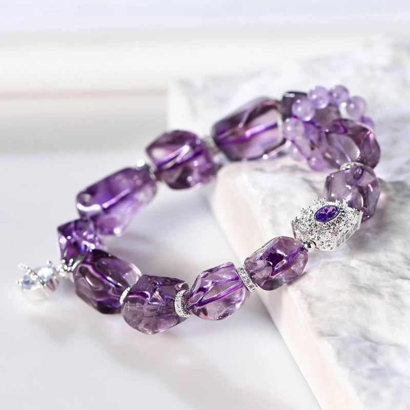 Amethyst accompanying bracelet with faceted cut stones and silver accents by Roline Crystal