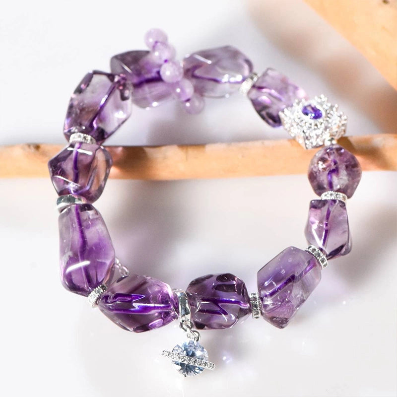Amethyst accompanying bracelet with faceted cut stones and silver accents by Roline Crystal
