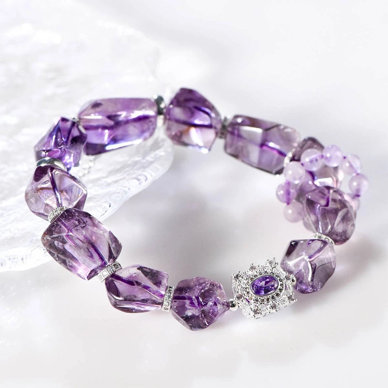 Amethyst accompanying bracelet with faceted cut stones and silver accents by Roline Crystal