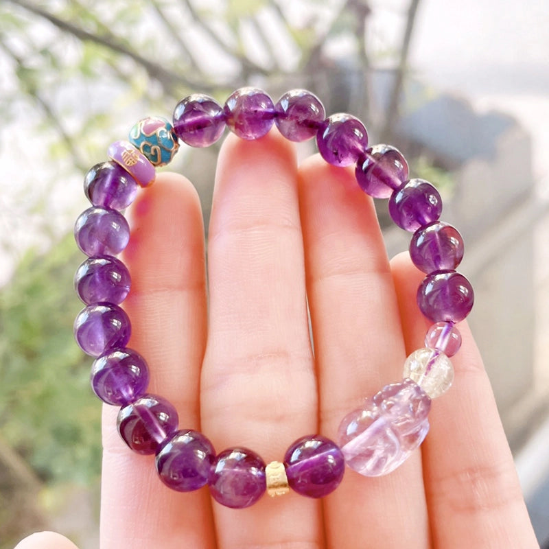 Amethyst bracelet with Pixiu charm and Golden Rutilated Quartz beads by Roline Crystal