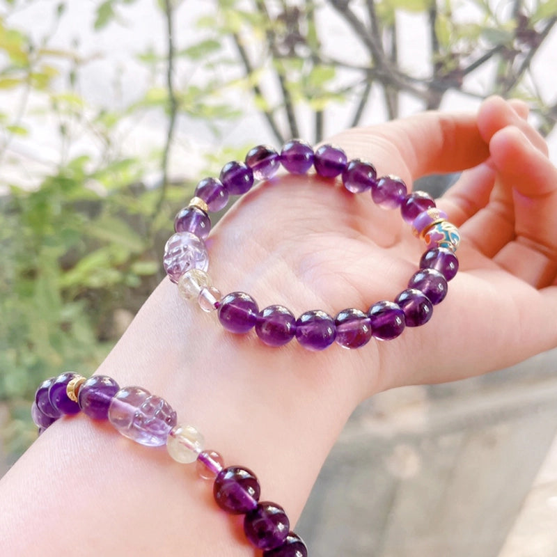 Amethyst bracelet with Pixiu charm and Golden Rutilated Quartz beads by Roline Crystal