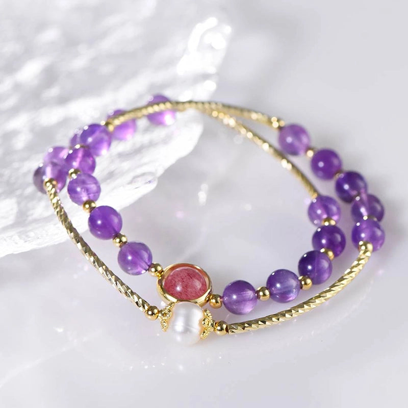 Amethyst double ring bracelet with strawberry quartz, pearls, and gold accents by Roline Crystal