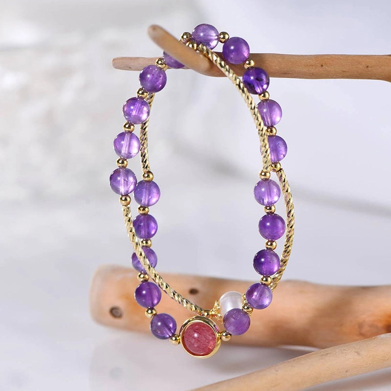 Amethyst double ring bracelet with strawberry quartz, pearls, and gold accents by Roline Crystal
