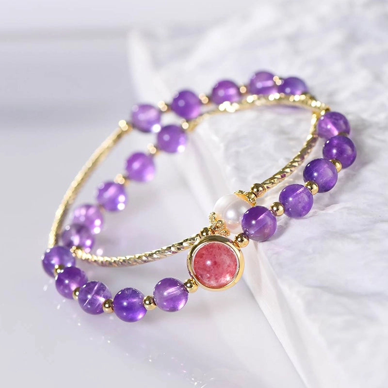 Amethyst double ring bracelet with strawberry quartz, pearls, and gold accents by Roline Crystal