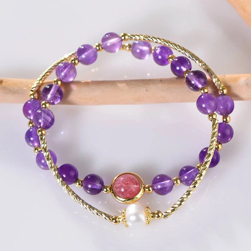 Amethyst double ring bracelet with strawberry quartz, pearls, and gold accents by Roline Crystal