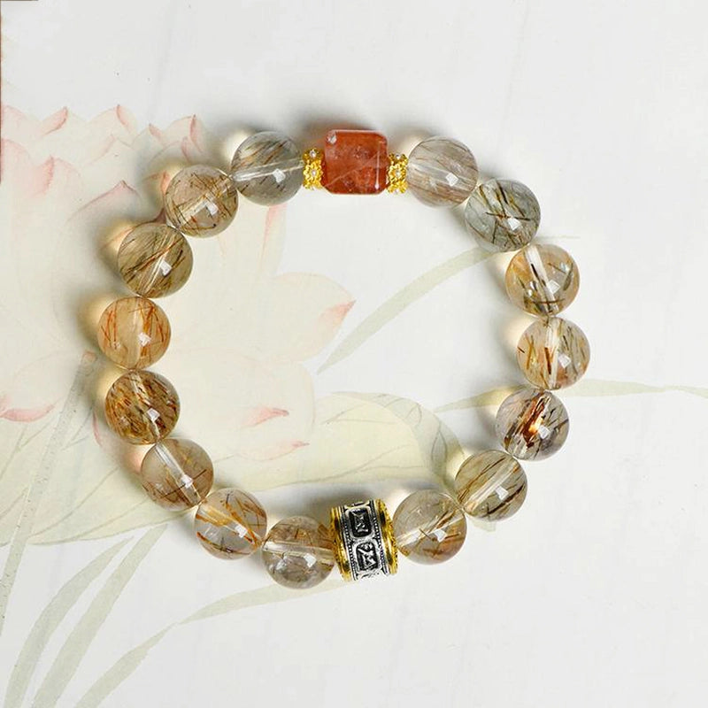 Black Gold Super 7 bracelet with Red Hematoid Quartz and gold accents by Roline Crystal