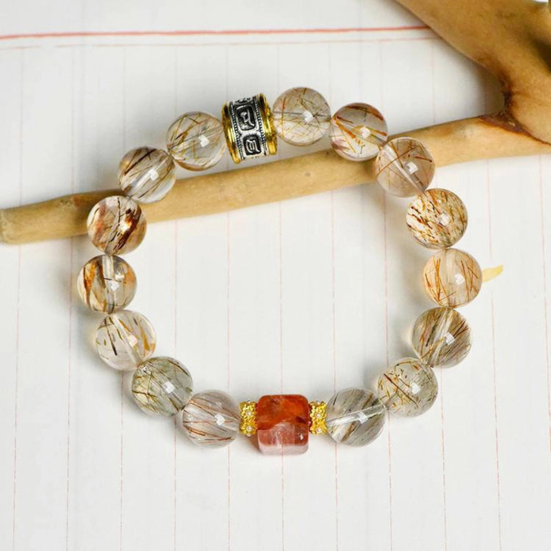 Black Gold Super 7 bracelet with Red Hematoid Quartz and gold accents by Roline Crystal