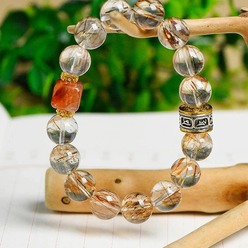 Black Gold Super 7 bracelet with Red Hematoid Quartz and gold accents by Roline Crystal