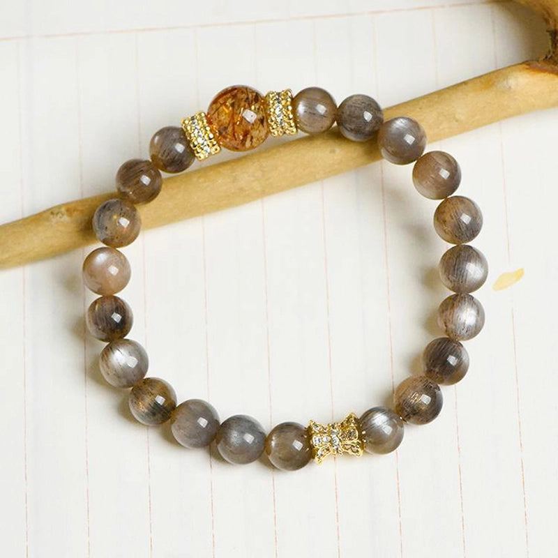 Black Sunstone bracelet with Black Gold Super 7 stones and gold accents – cosmic protection jewelry by Roline Crystal