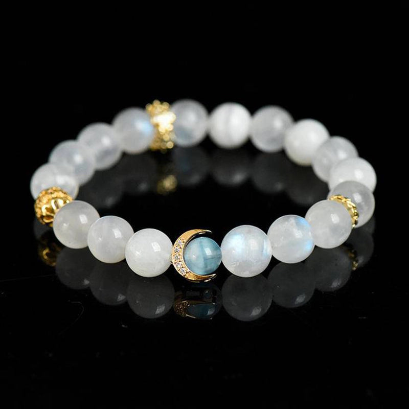 Blue Moonstone bracelet with aquamarine, clear quartz, and gold moon charms by Roline Crystal
