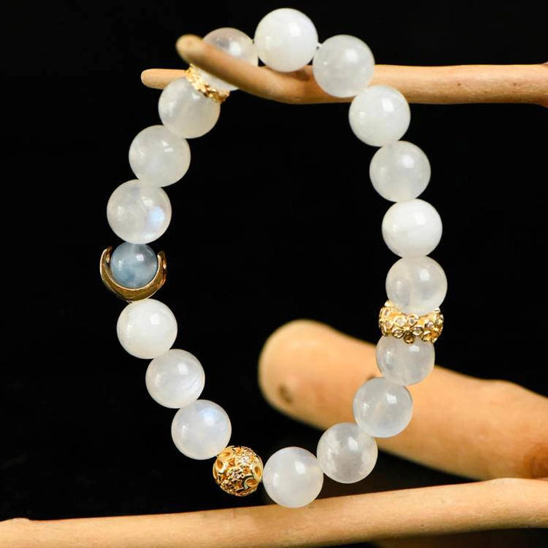Blue Moonstone bracelet with aquamarine, clear quartz, and gold moon charms by Roline Crystal