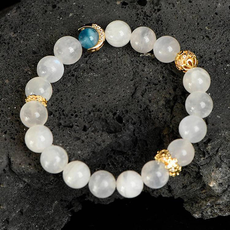 Blue Moonstone bracelet with aquamarine, clear quartz, and gold moon charms by Roline Crystal