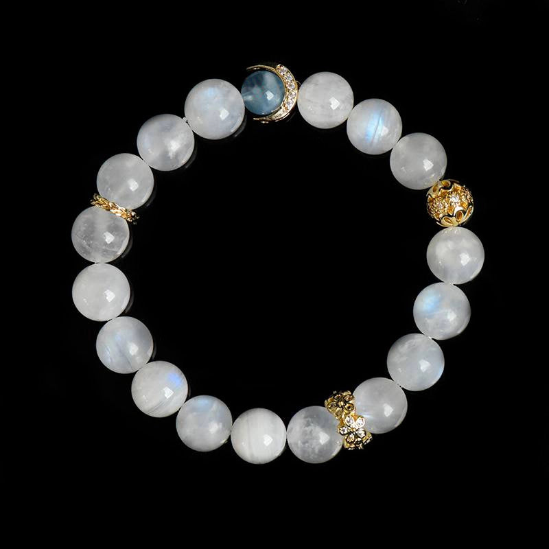Blue Moonstone bracelet with aquamarine, clear quartz, and gold moon charms by Roline Crystal