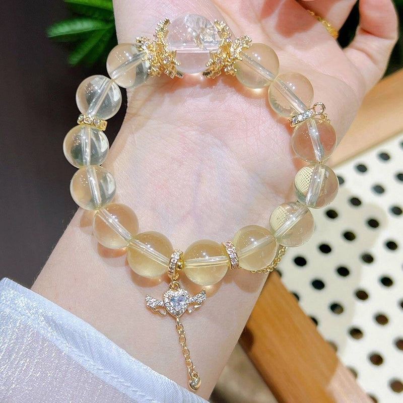 Citrine bracelet with gold chain accents and natural gemstone beads by Roline Crystal