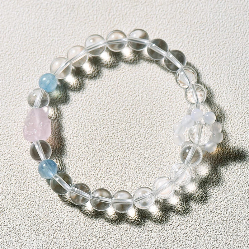 Clear Quartz bracelet with Aquamarine, Rose Quartz fox charm, and White Agate beads by Roline Crystal