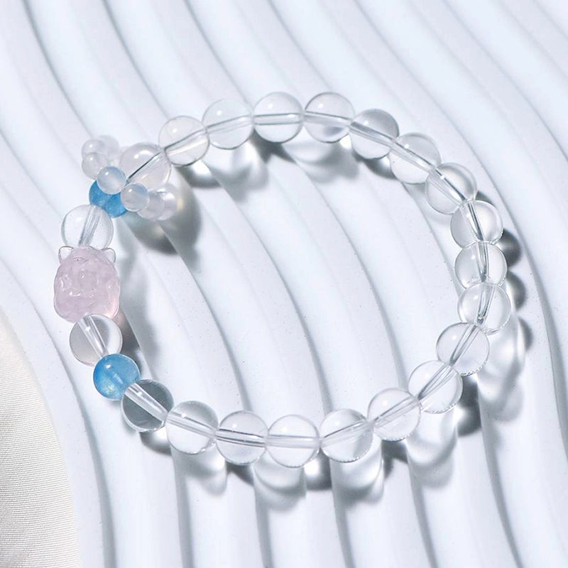Clear Quartz bracelet with Aquamarine, Rose Quartz fox charm, and White Agate beads by Roline Crystal