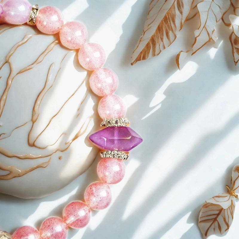 Double-pointed Strawberry Crystal and Amethyst bracelet with geometric design by Roline Crystal