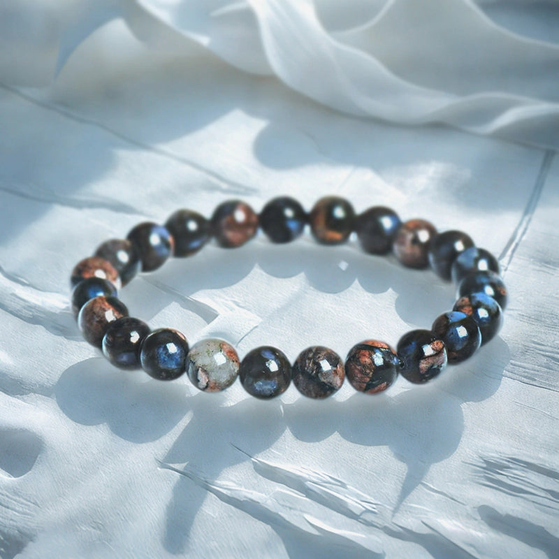 Glaucophane bracelet with polished 8mm blue-gray beads by Roline Crystal