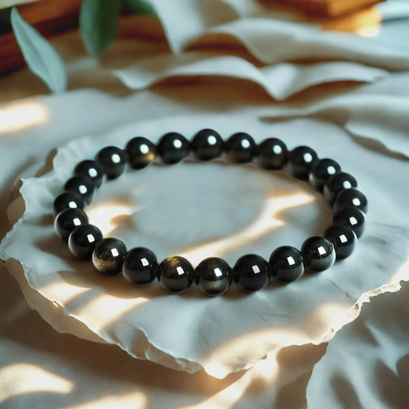 Golden Sheen Obsidian bracelet with 8mm cosmic beads by Roline Crystal
