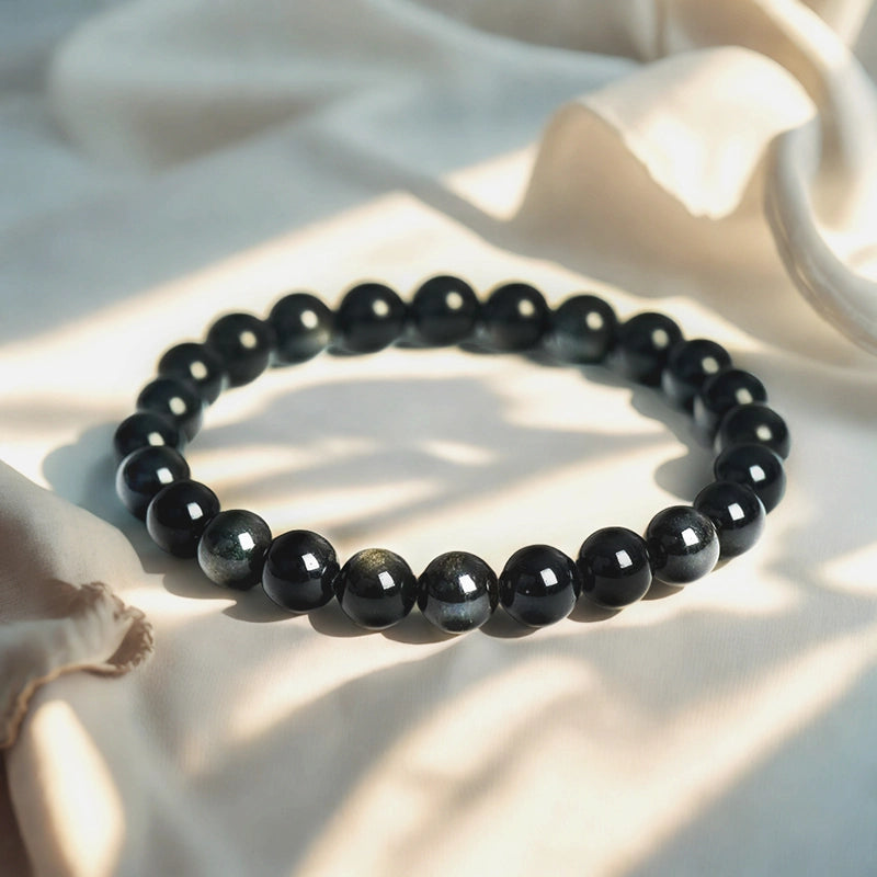 Golden Sheen Obsidian bracelet with 8mm cosmic beads by Roline Crystal