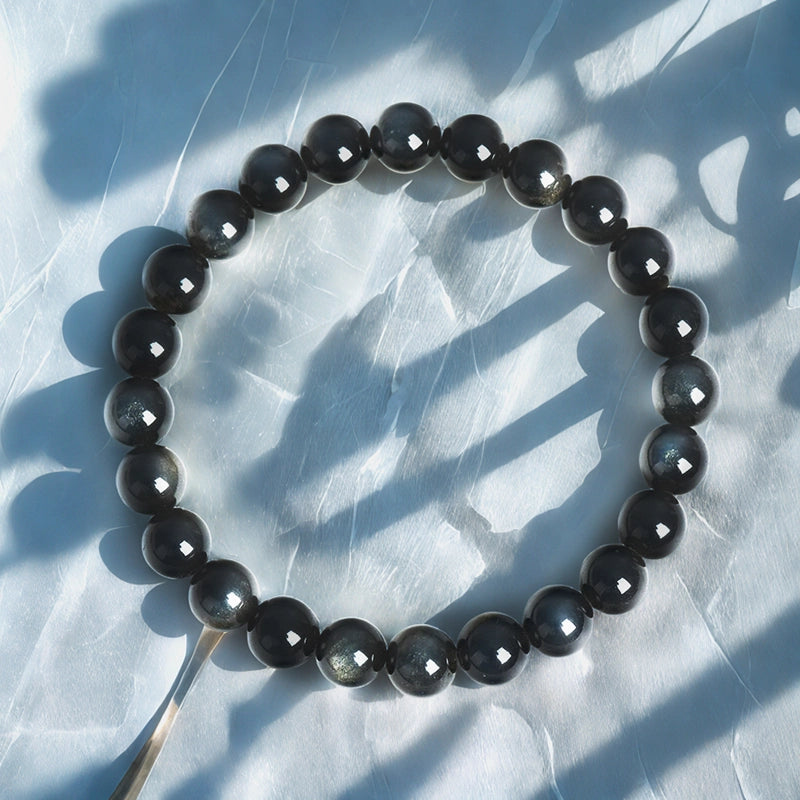 Golden Sheen Obsidian bracelet with 8mm cosmic beads by Roline Crystal