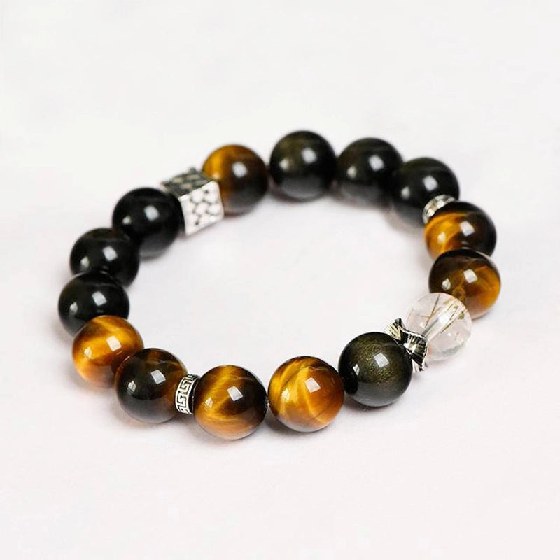Golden Sheen Obsidian bracelet with Black Gold Super 7, Yellow Tiger’s Eye, and silver accents by Roline Crystal