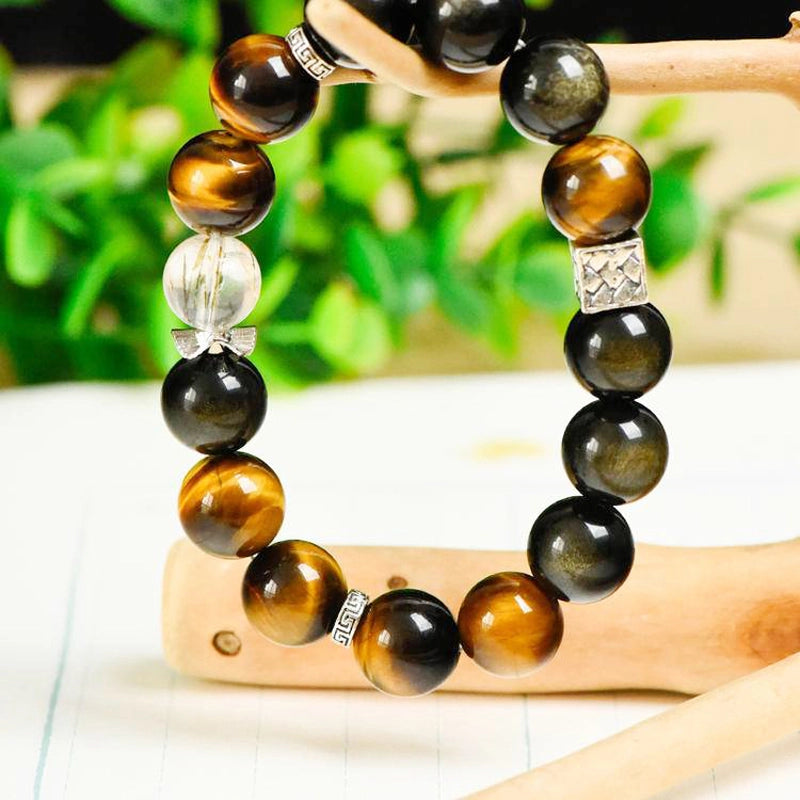 Golden Sheen Obsidian bracelet with Black Gold Super 7, Yellow Tiger’s Eye, and silver accents by Roline Crystal