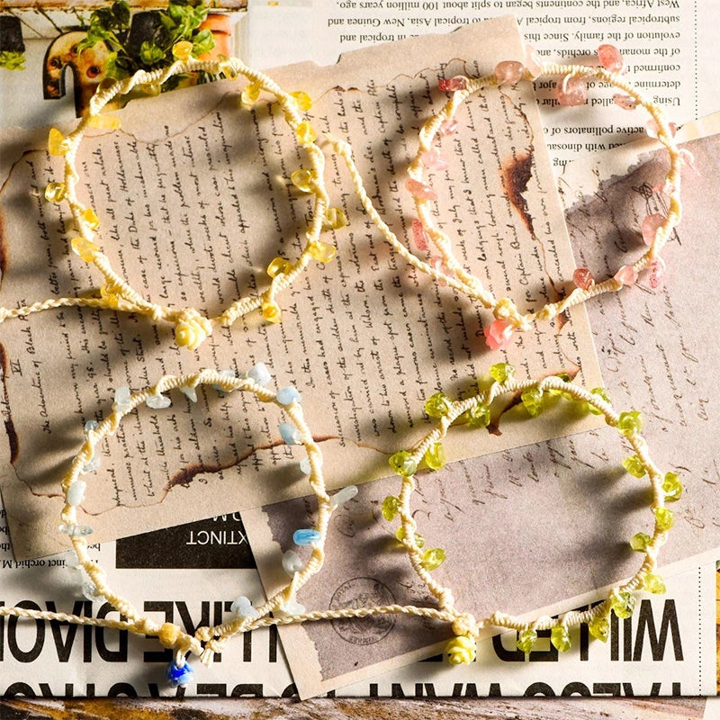 Hand-woven gravel crystal bracelet with peridot, strawberry quartz, citrine, aquamarine, and amethyst by Roline Crystal