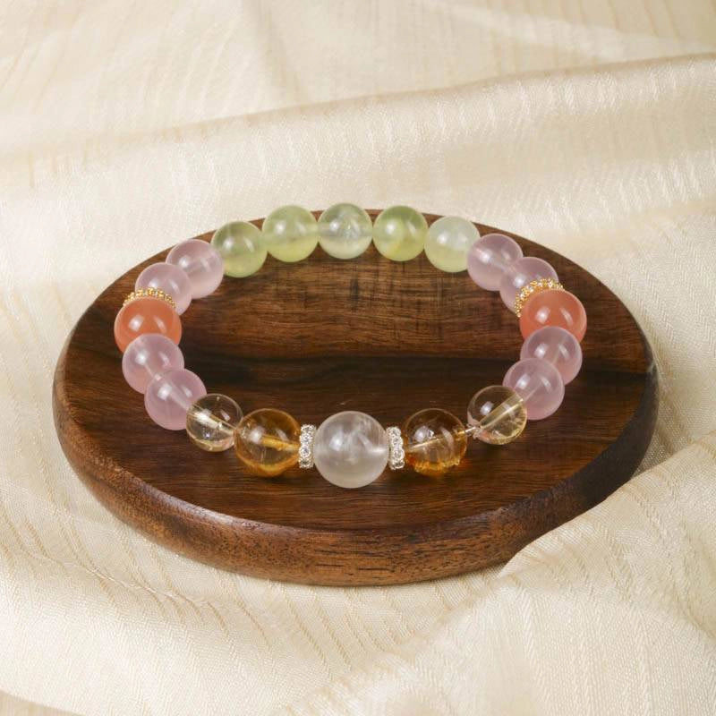 Monet Water Lily-inspired Rose Quartz bracelet with Citrine, Grape Agate, Red Agate, and gold accents by Roline Crystal