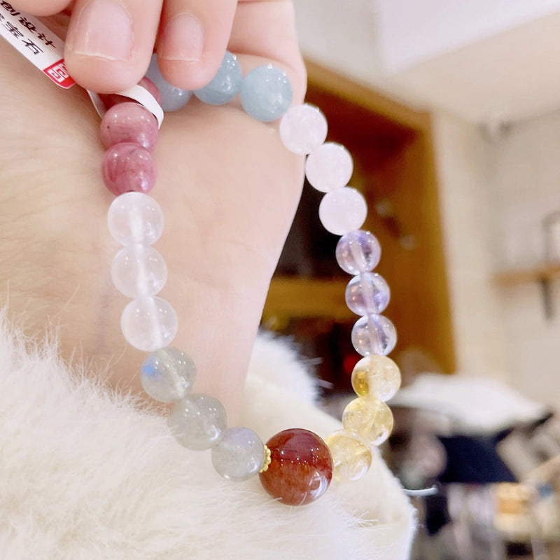 Multi-gemstone healing bracelet with moonstone, rose quartz, and amethyst beads by Roline Crystal
