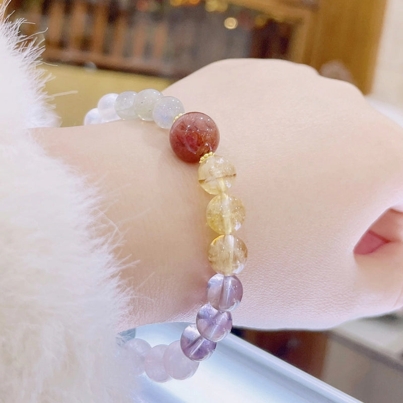 Multi-gemstone healing bracelet with moonstone, rose quartz, and amethyst beads by Roline Crystal