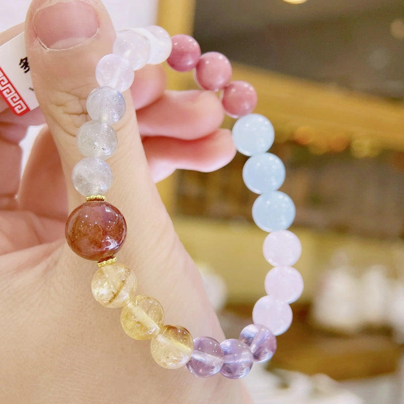 Multi-gemstone healing bracelet with moonstone, rose quartz, and amethyst beads by Roline Crystal