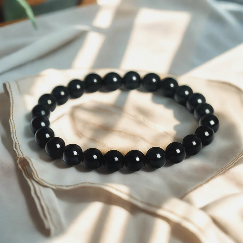 Obsidian bracelet with polished 8mm volcanic beads by Roline Crystal