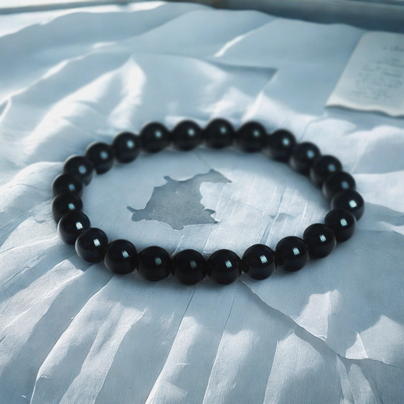 Obsidian bracelet with polished 8mm volcanic beads by Roline Crystal
