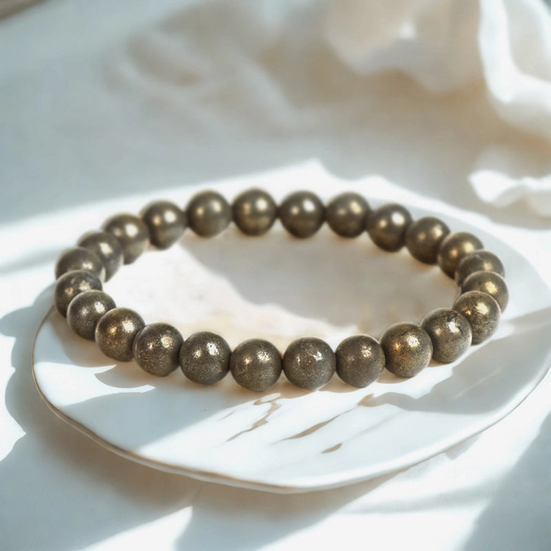 Pyrite bracelet with golden metallic beads by Roline Crystal