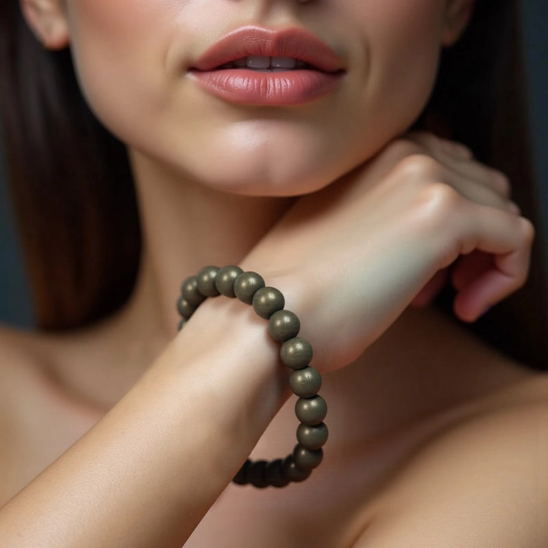Pyrite bracelet with golden metallic beads by Roline Crystal