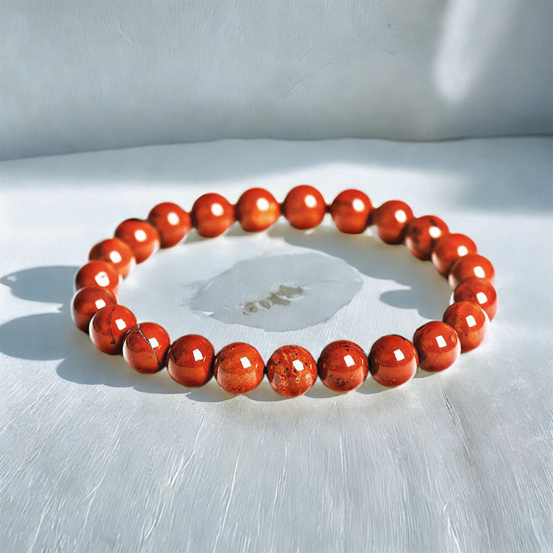 Red Jasper bracelet with polished 8mm crimson beads by Roline Crystal