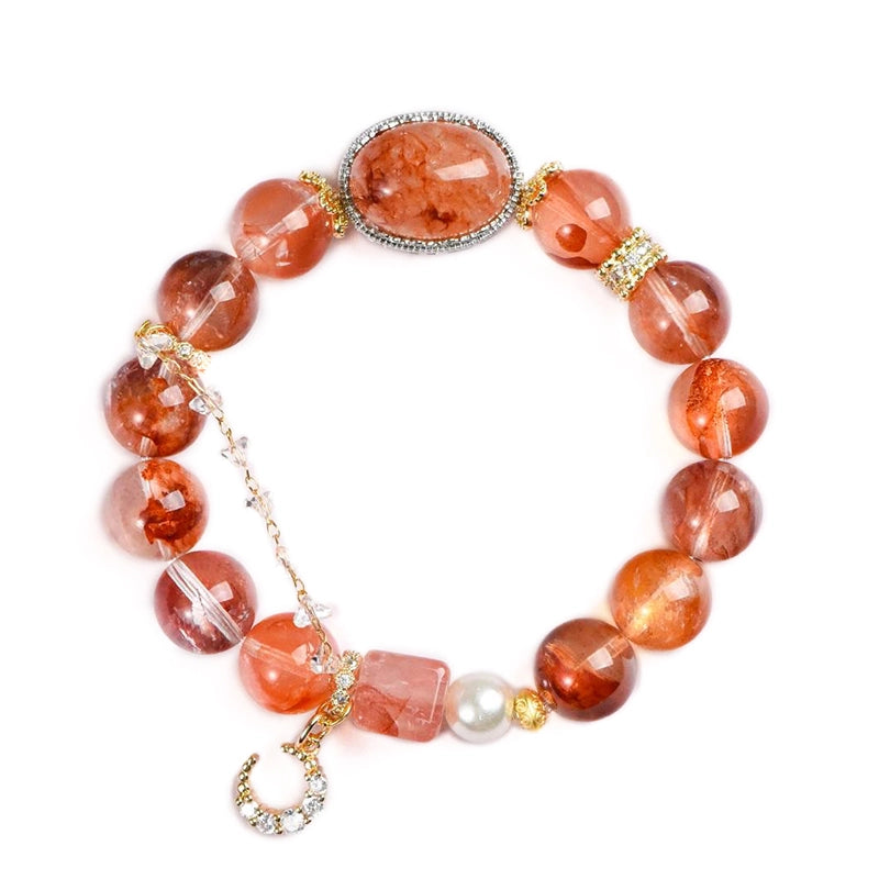 Red gum flower bracelet with golden moon charm, magic box bead, and pearls by Roline Crystal