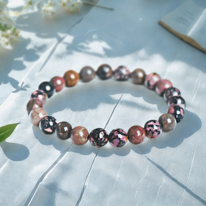 Rhodonite bracelet with pink and black 8mm marbled beads by Roline Crystal