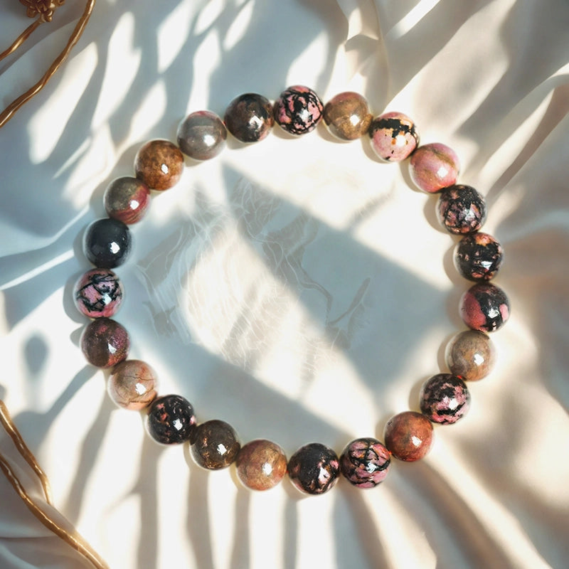 Rhodonite bracelet with pink and black 8mm marbled beads by Roline Crystal