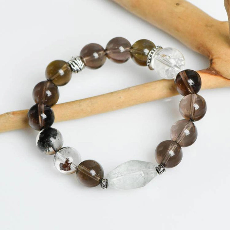 Smoky Quartz bracelet with Phantom Quartz, Clear Quartz, and silver charms – grounding crystal jewelry by Roline Crystal
