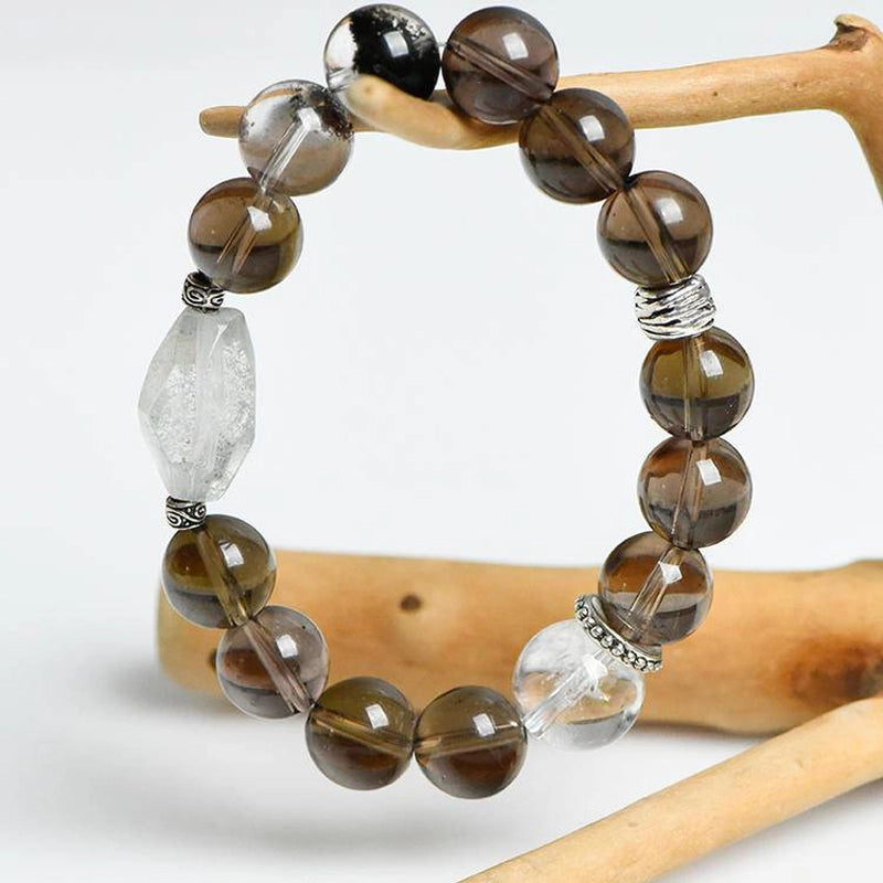 Smoky Quartz bracelet with Phantom Quartz, Clear Quartz, and silver charms – grounding crystal jewelry by Roline Crystal
