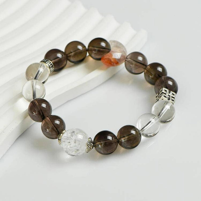 Smoky Quartz bracelet with Red Hematoid Quartz Moon, Clear Quartz, and silver charms – protective crystal jewelry by Roline Crystal