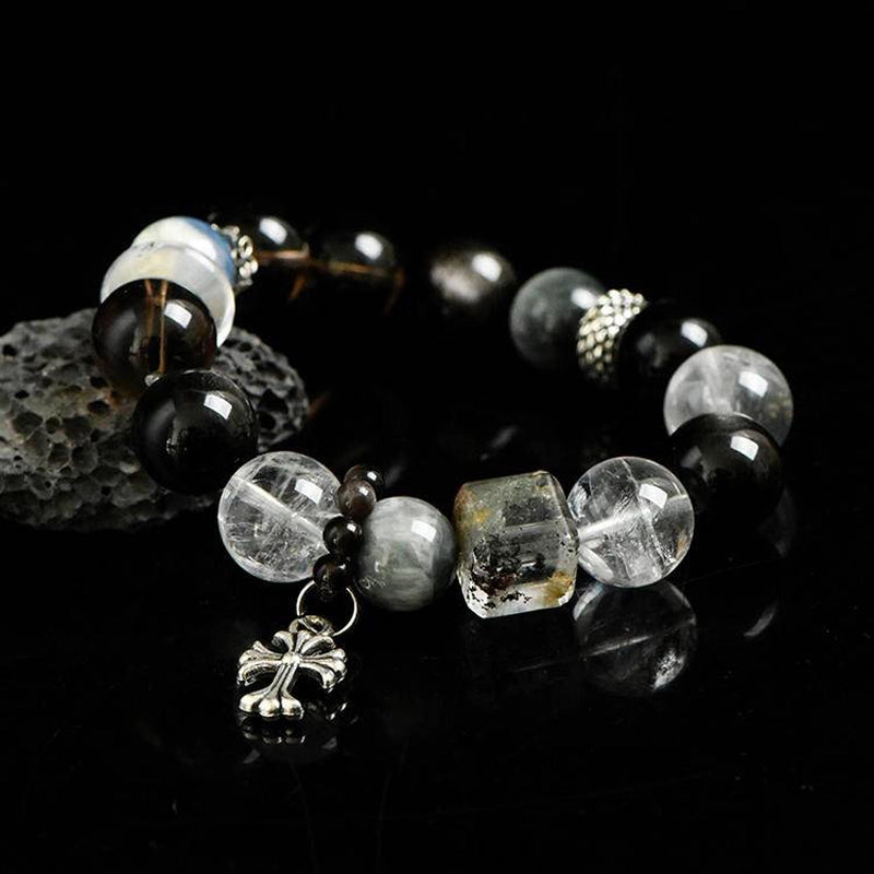 Smoky Quartz bracelet with Silver Sheen Obsidian, Clear Quartz, Phantom Quartz, and silver cross charm – spiritual crystal jewelry by Roline Crystal