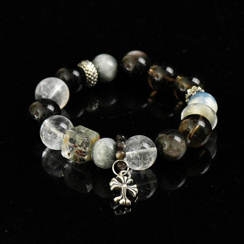 Smoky Quartz bracelet with Silver Sheen Obsidian, Clear Quartz, Phantom Quartz, and silver cross charm – spiritual crystal jewelry by Roline Crystal