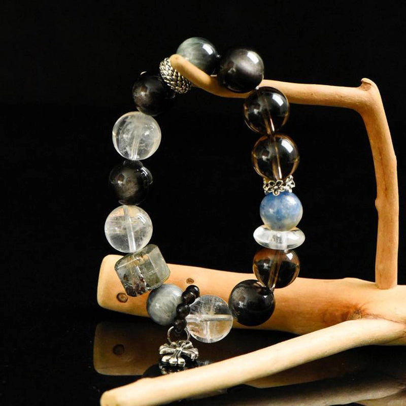 Smoky Quartz bracelet with Silver Sheen Obsidian, Clear Quartz, Phantom Quartz, and silver cross charm – spiritual crystal jewelry by Roline Crystal