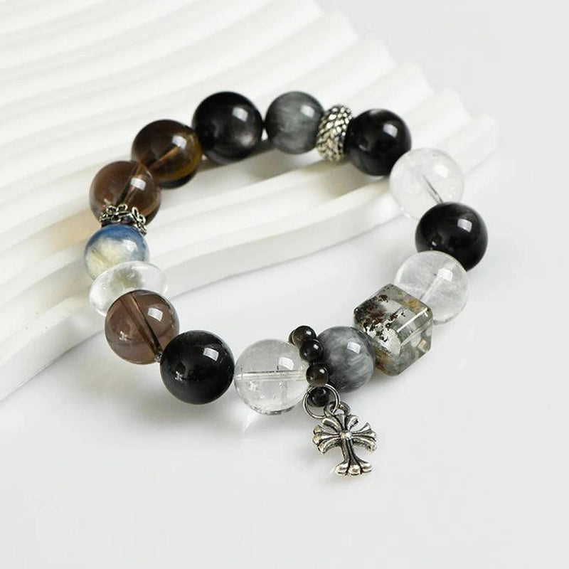 Smoky Quartz bracelet with Silver Sheen Obsidian, Clear Quartz, Phantom Quartz, and silver cross charm – spiritual crystal jewelry by Roline Crystal