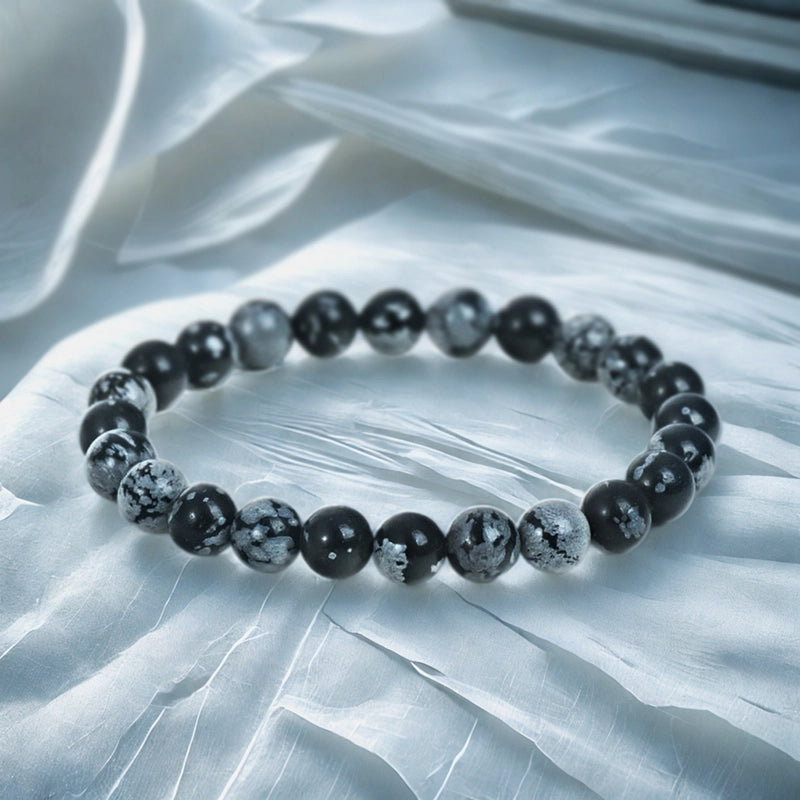 Snowflake Obsidian bracelet with 8mm speckled beads by Roline Crystal