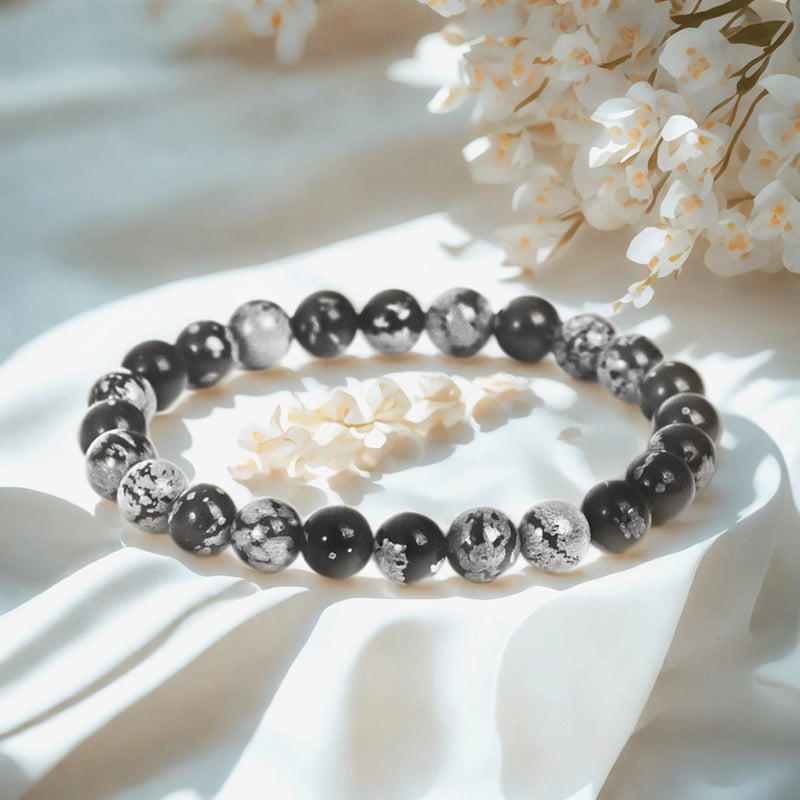 Snowflake Obsidian bracelet with 8mm speckled beads by Roline Crystal